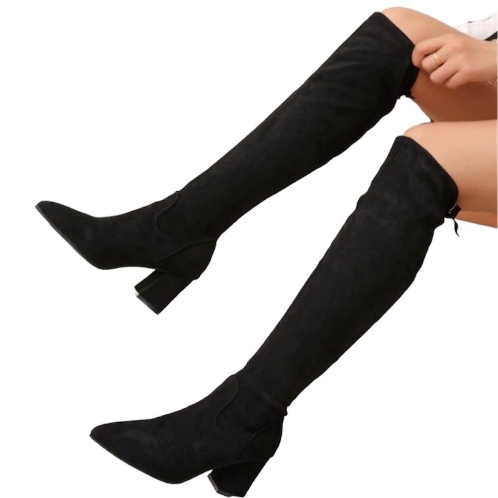 Never worn, black heeled boots